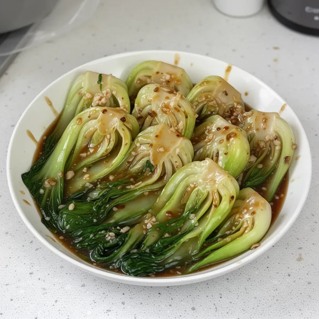 Delicious plate of Bok Choy with Oyster Sauce served with rice.